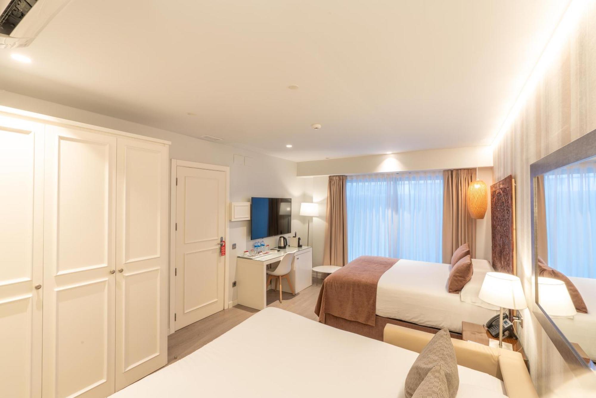 Serennia Fira Gran Via Exclusive Rooms Оспиталет-де-Льобрегат Экстерьер фото